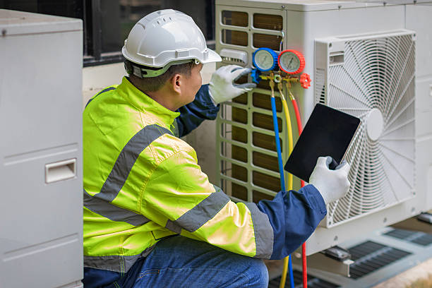 Professional Air Duct Cleaning technician working in Fleming Island, FL